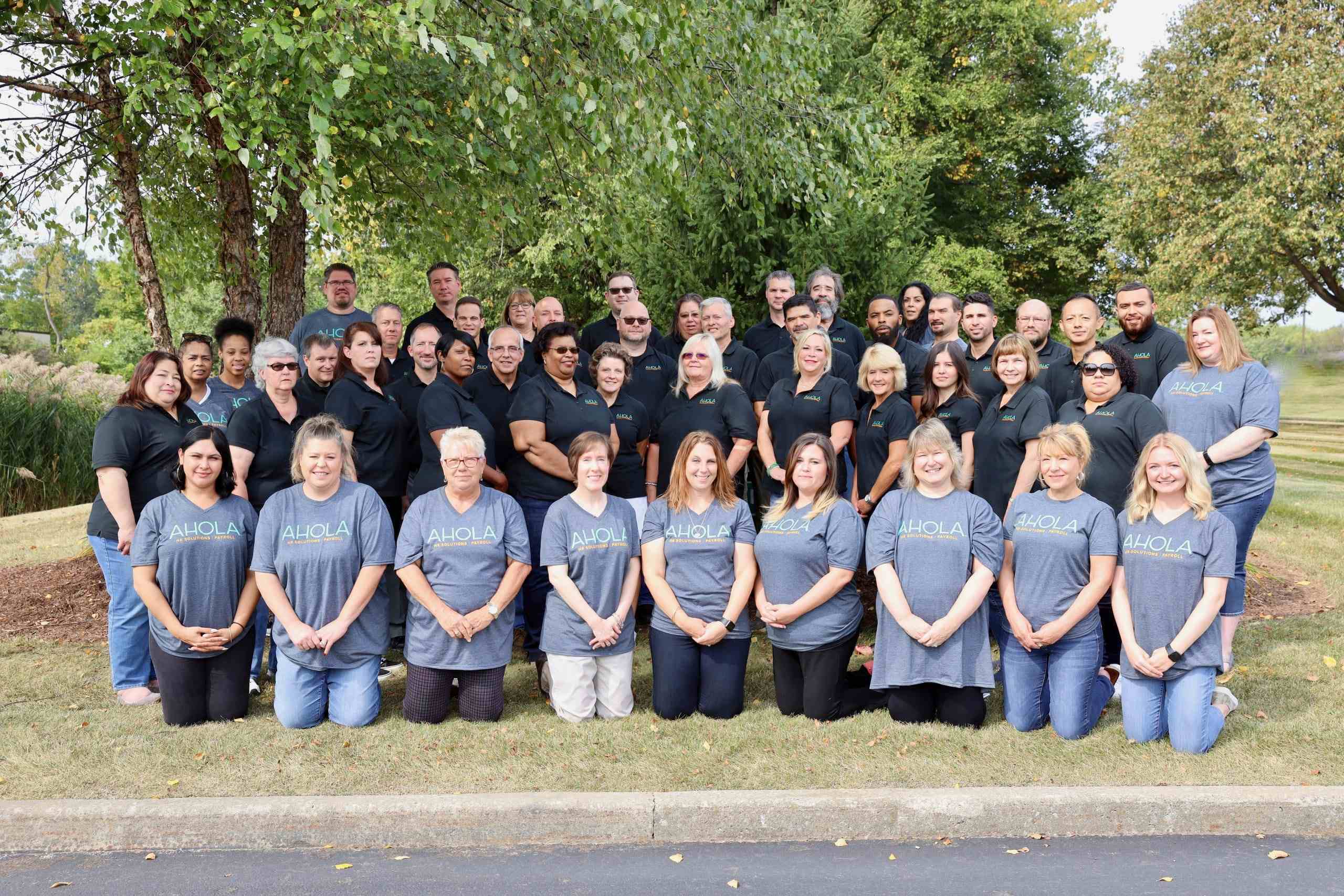 group of people in blue tees